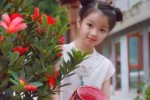 哪吒头怎么配衣服穿（小女孩穿唐服扎什么样的头发）